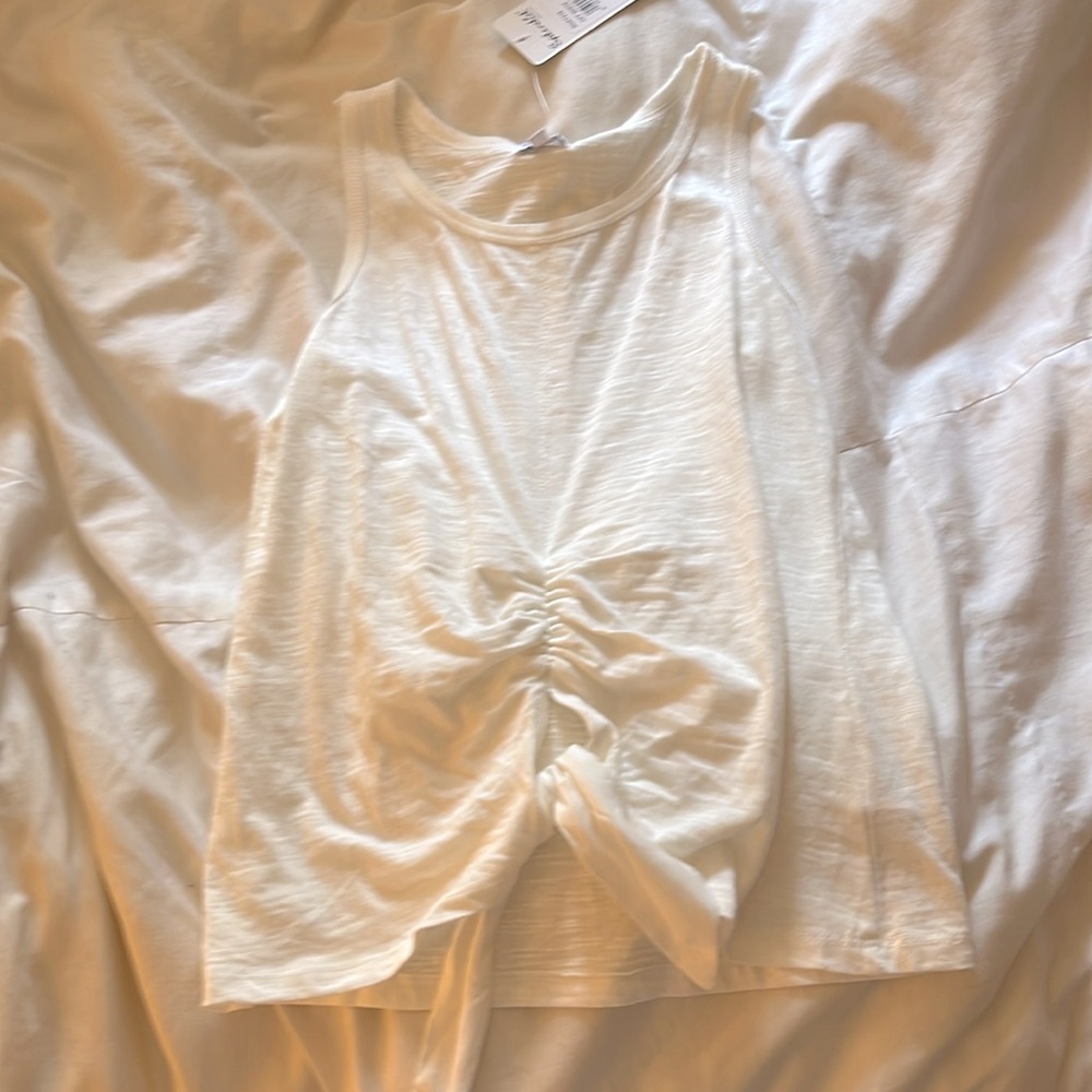 Kids white tank top never been worn before still has tag size 12